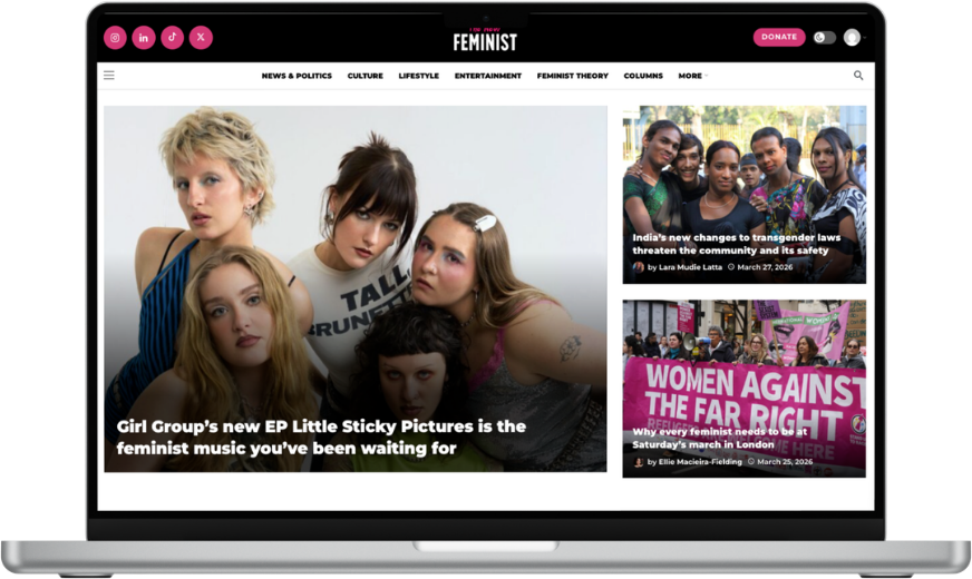 The New Feminist website homepage shown on a laptop.